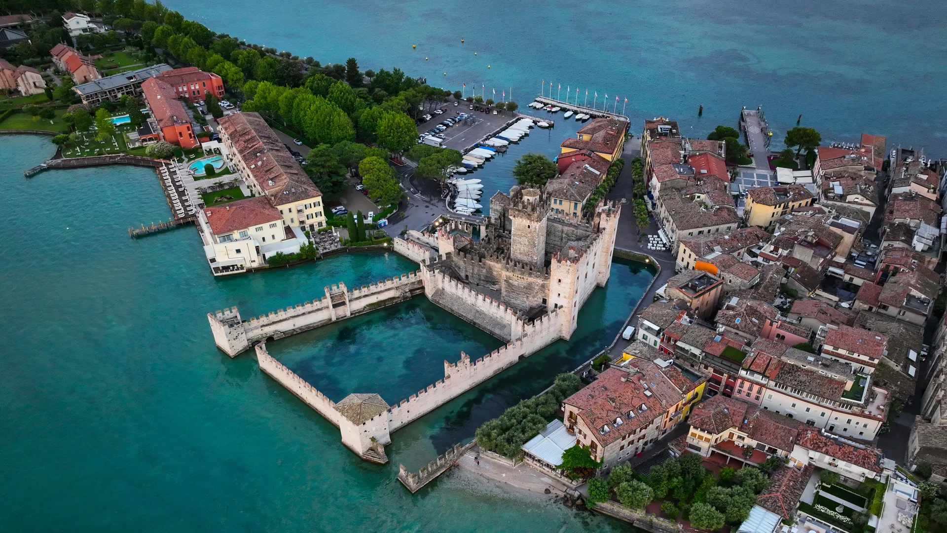 Aerial view of the moated Scaliger Castle at the tip of the Sirmione peninsula on Lake Garda